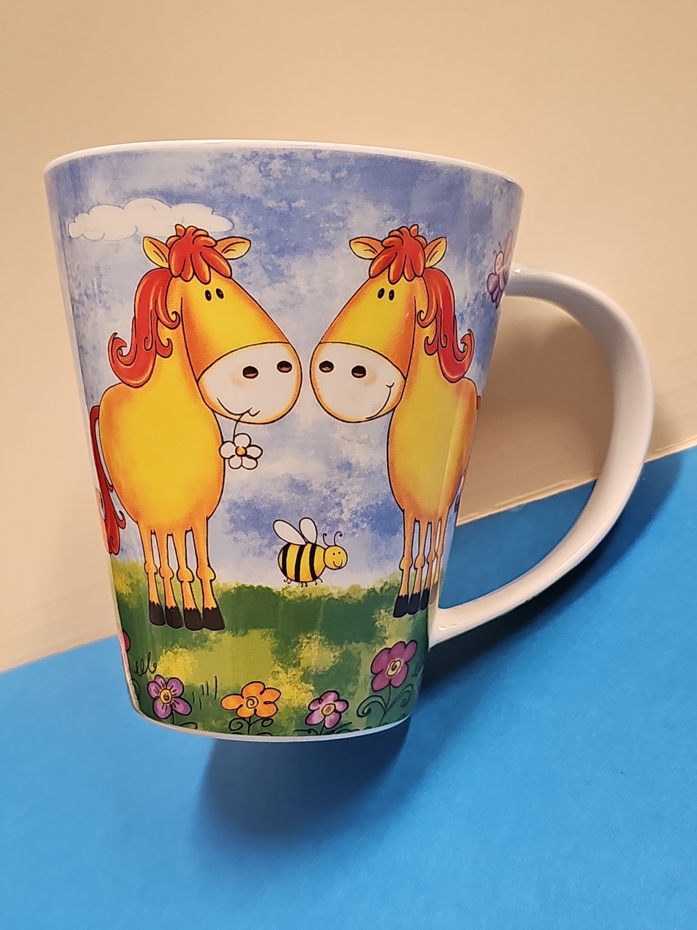 Yellow Horses Ceramic Coffee Mug with Playful Meadow Design